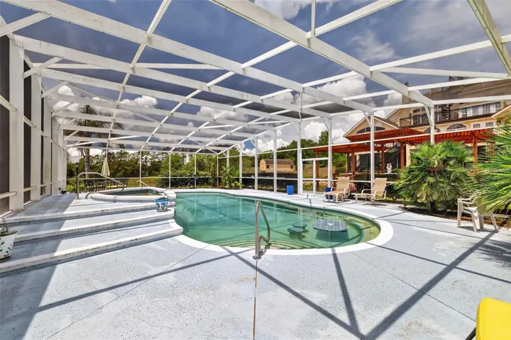 Screen Enclosed Heated Pool and Spa
