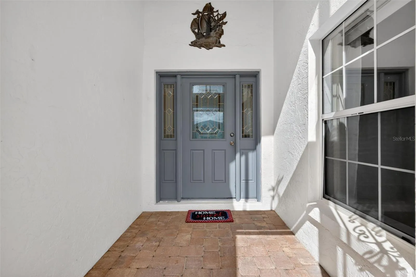 Welcoming enclosed entry way.