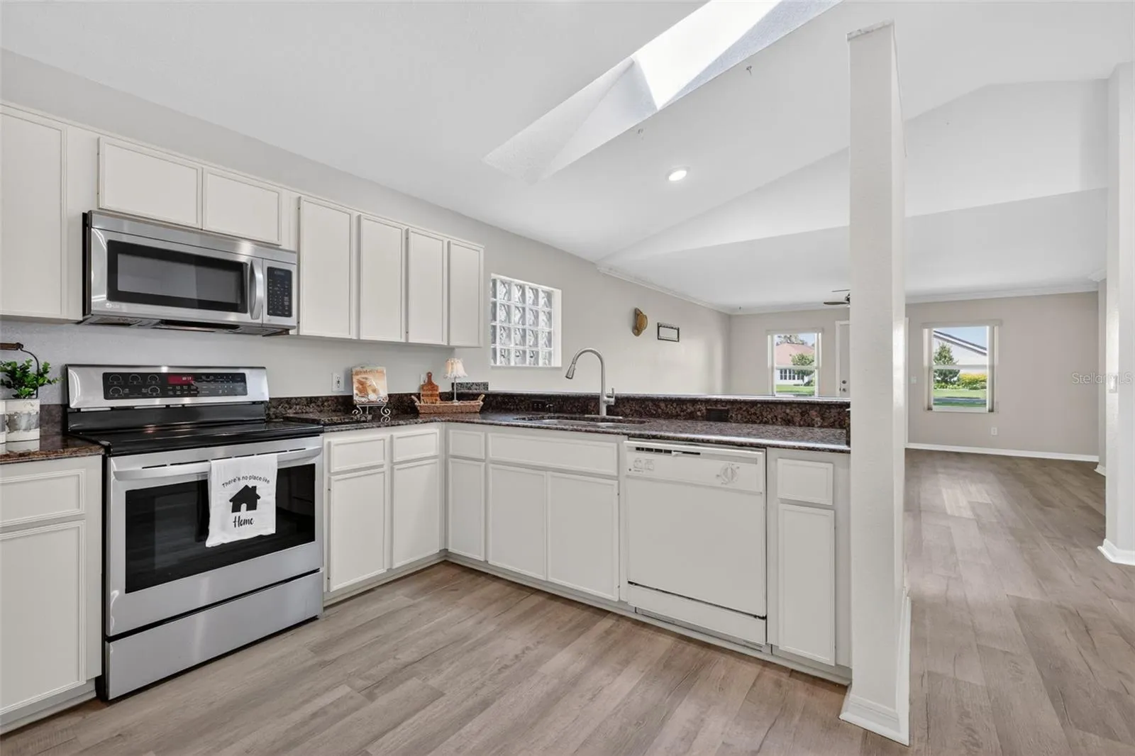 Skylight fills the kitchen with beautiful natural light.