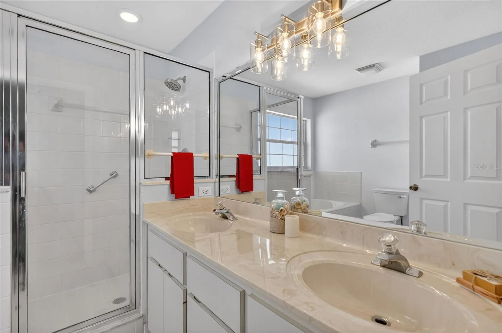 En suite #1 has dual sinks and walk in shower.