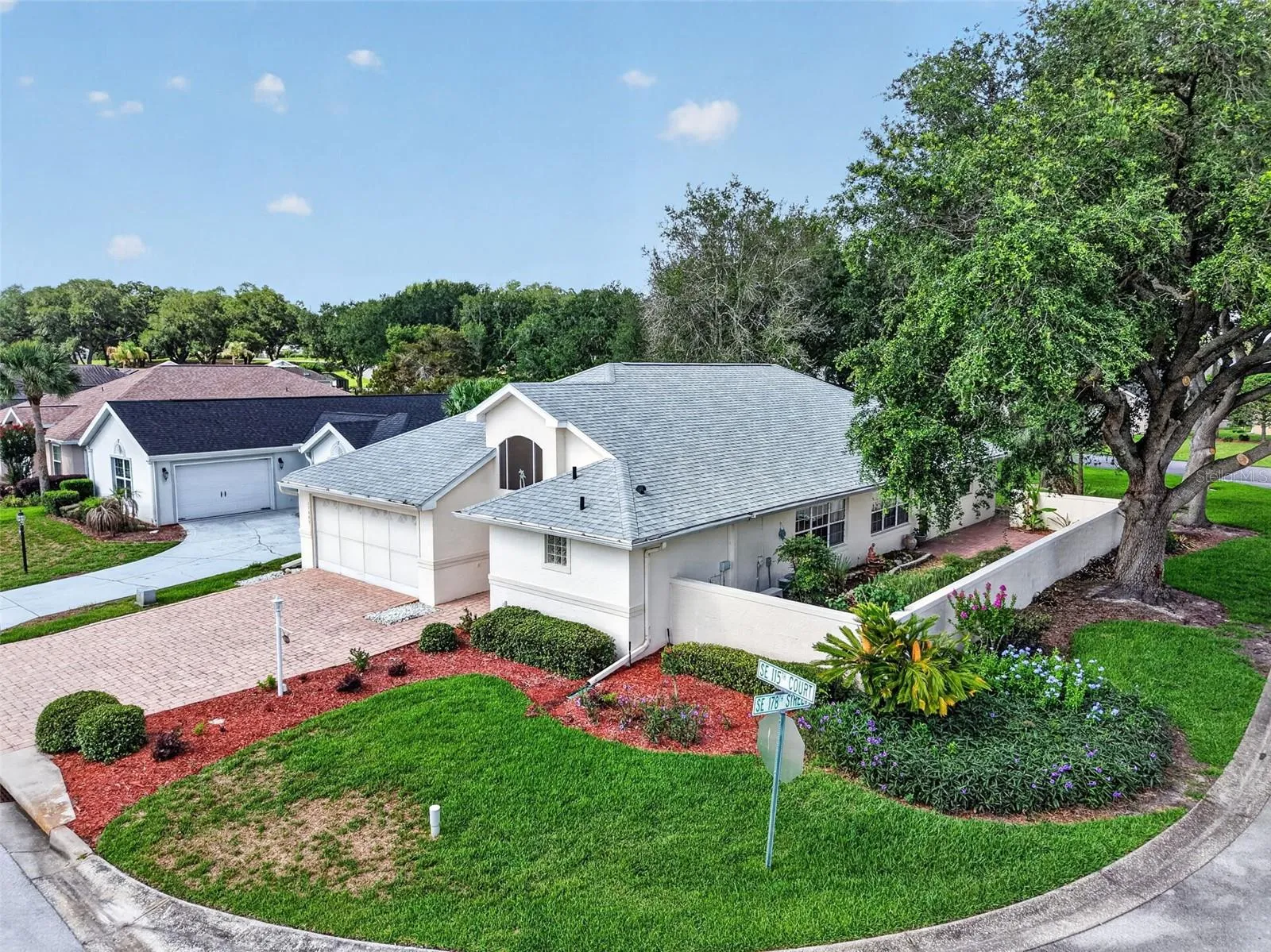 Corner lot shaded by mature trees. No homes behind!