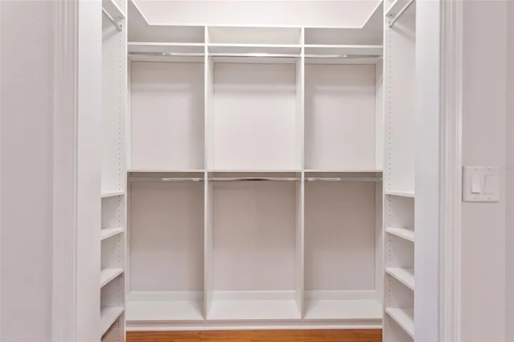 Virtually Staged-Primary Walk-In Custom Closet Two