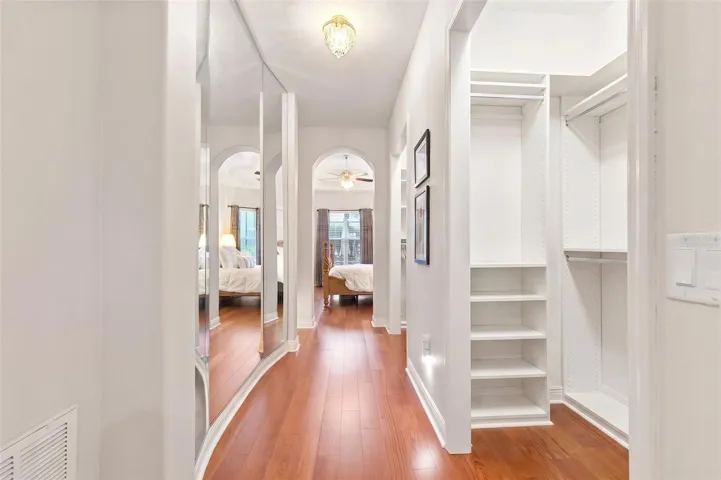 Virtually staged- Primary Walk-In Custom Closet Two
