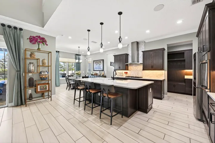 The open kitchen keeps everyone connected.