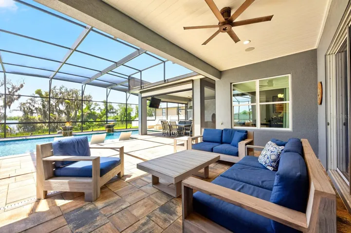 Covered paver lanai overlooks your private screened pool.