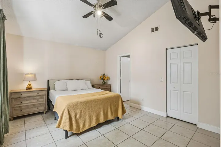 primary bedroom with walk in closet