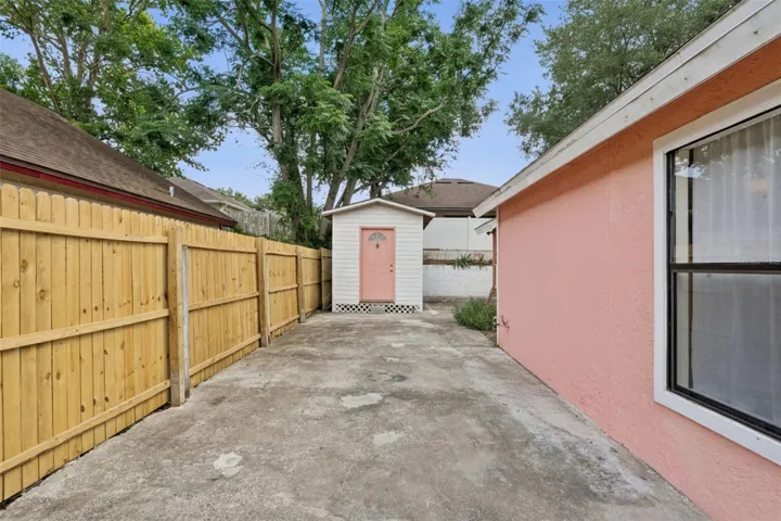 large side yard - plenty of room for toys, pets, outdoor activities