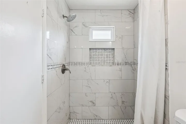 primary bathroom nicely updated shower