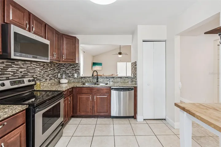 596 Swallow Ct Kitchen with updated cabinets and granite countertops