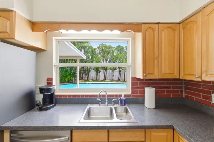 Kitchen window Looks out to pool