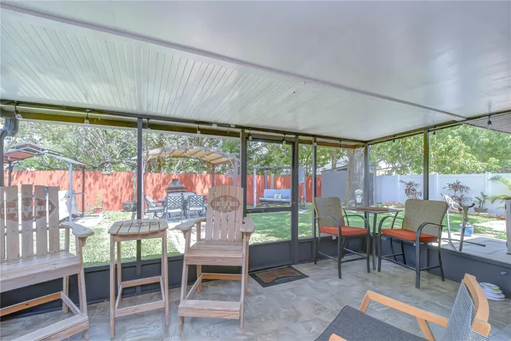 Screened in porch overlooks your magazine ready backyard with new grass.  I think this is my award for this years outstanding backyard!  Come see what you think.