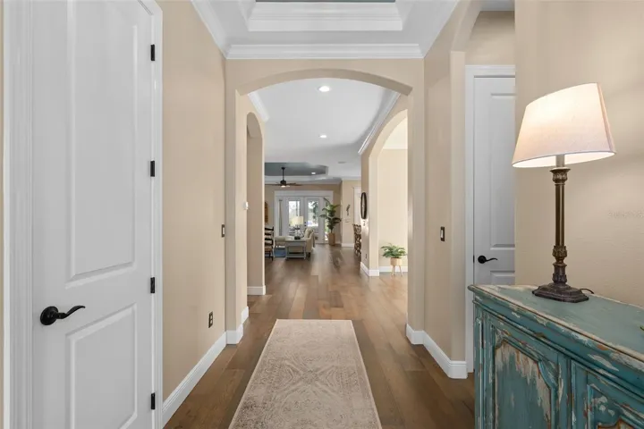 Foyer with Tray Ceiling, Coat Closet and a See Through Floor Plan