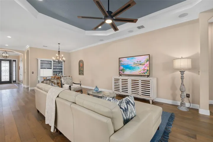 Can you picture yourself watching your favorite movies here? Surround Sound Speakers are already in the ceiling. The Engineered Hardwood Floors are stunning.