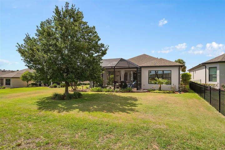 Rear View with a nice size rear yard that is large enough for a pool if you desire.