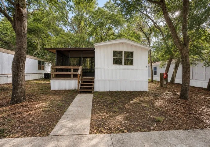 Front of Home with enclosed front porch