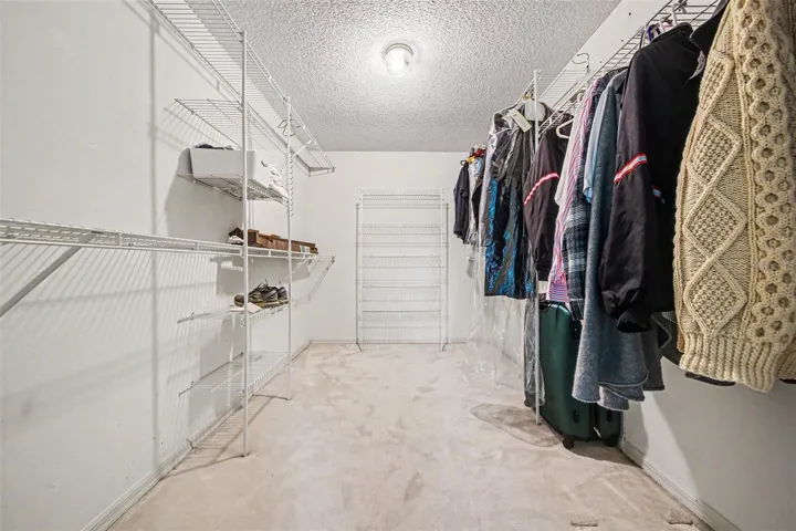 Walk-In Closet in Primary Bedroom