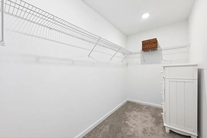 Primary suite walk-in closet.