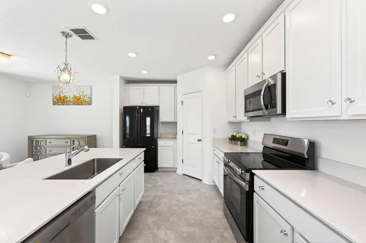Stainless steel appliances and ample storage.