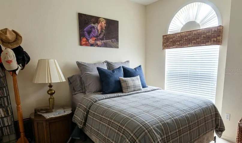 Virtually staged - Bedroom two is at the front of the villa