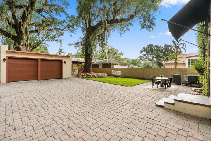 Stunning large backyard with 2 car detached garage.