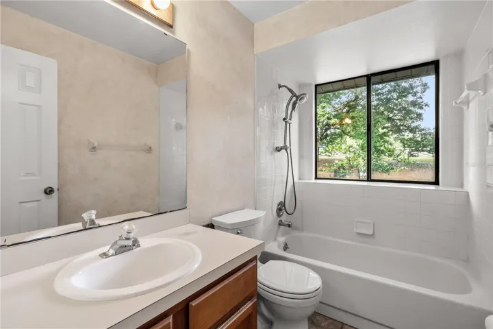Bathroom #2 with Bathtub, Vanity and Toilet