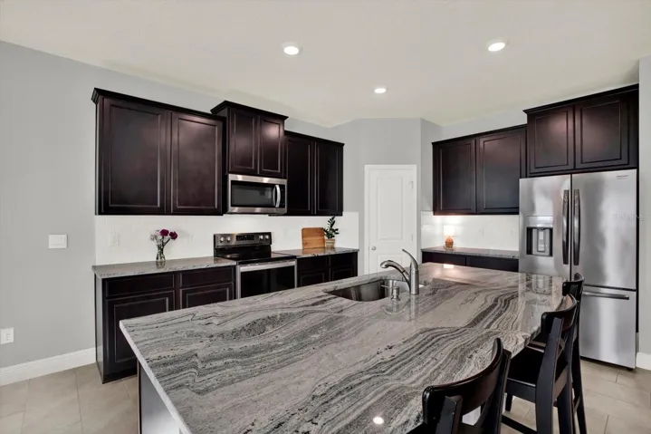 Gorgeous granite counters in kitchen and throughout the home