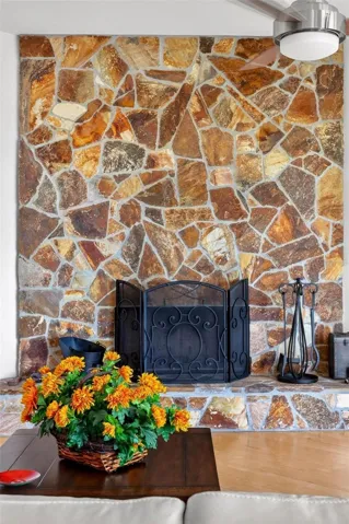 Enjoy the beauty of Lake Dorr by day and the warmth of a crackling fire by night. This stone wood-burning fireplace brings cozy charm to the great room, making the home feel inviting, peaceful, and perfect for year-round lakefront living