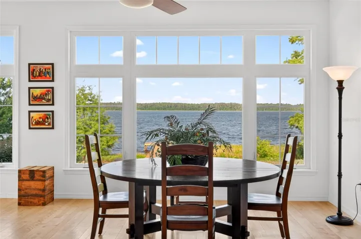 Imagine gathering around the table as Lake Dorr becomes your backdrop — where dinners feel magical, mornings begin with water views, and every meal is surrounded by light, nature, and peace.