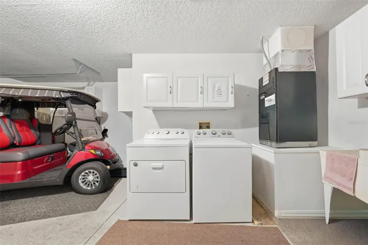 Storage and utility sink in garage.