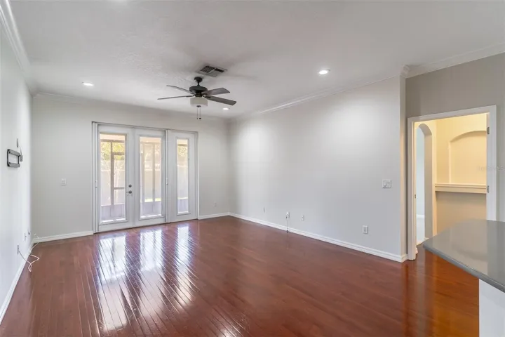 Living room with French doors to screened patio