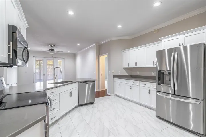 Gleaming stainless steel appliances and ample storage