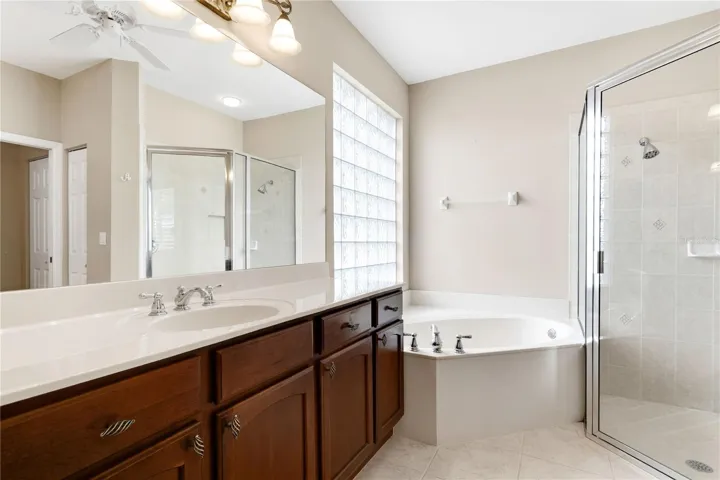 Primary bathroom with soaking tub and separate shower