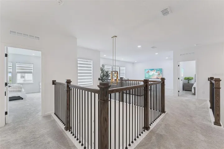 Upgraded rainlings and wood tread staircase