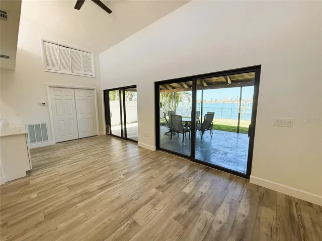Vaulted Cieling and Sliding Doors to Covered Patio