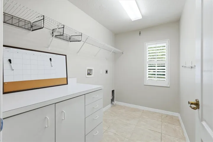 Laundry room with storage