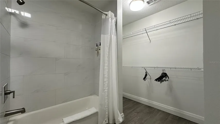 Guest bathroom/walk-in closet
