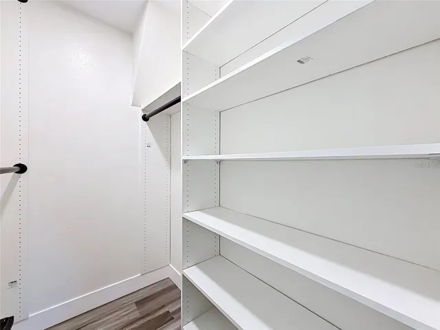 Primary Bedroom WalkIn Closet