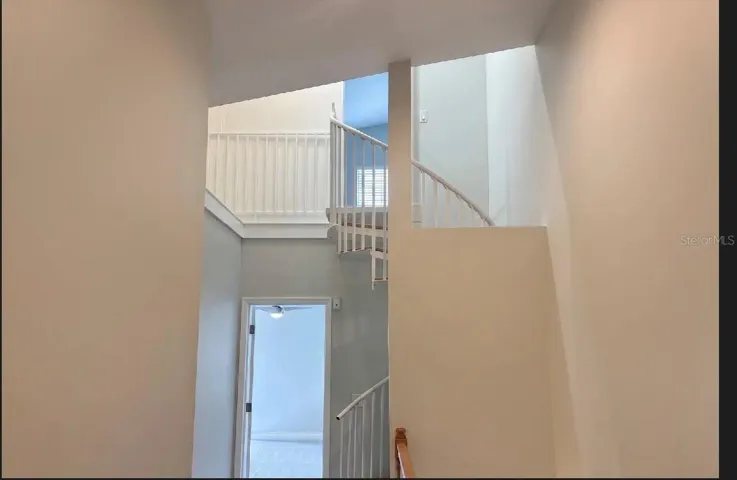 Staircase up to fourth bedroom