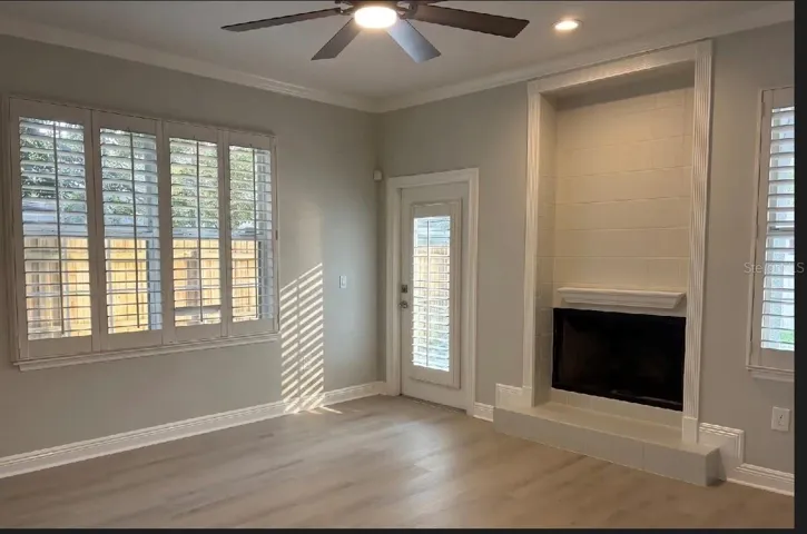 Living room with plantain shutters throughout