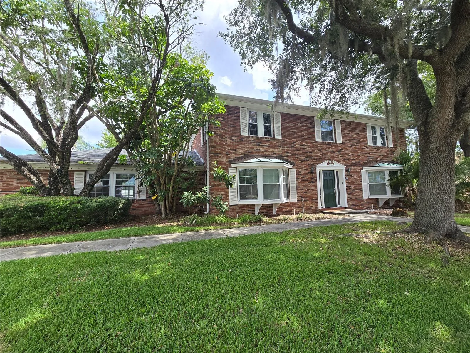 Front view. Beautiful 2 story home in gated golf course community.