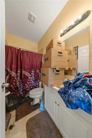 Full Bath attached to 12X12 room in 4 car detached garage