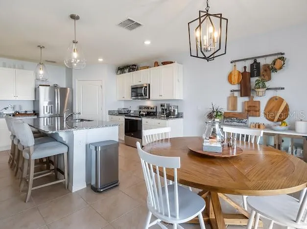 Great kitchen & dinette space connected to living room