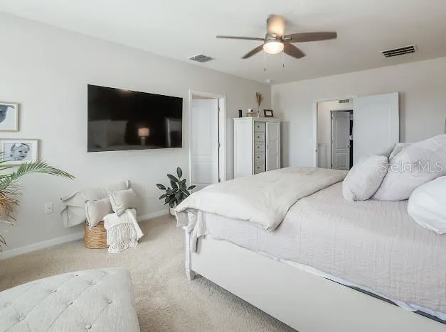 Primary bedroom en suite area which is oversized for sitting/office space, large walk in closet, great bathroom with walk in shower, double sinks and water closet