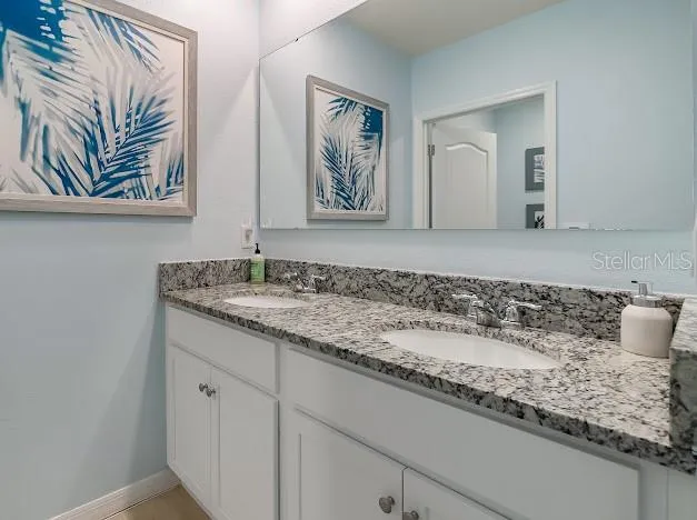 Full bathroom 3 that is upstairs. Tub/shower with toilet is split off form double sink area so multiple people can have bathroom access privately