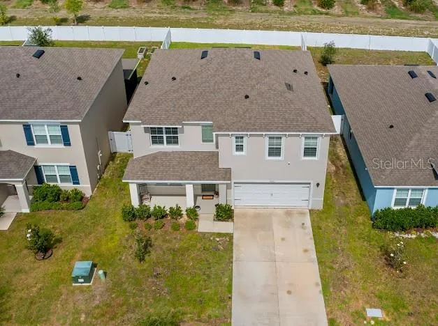 Front aerial view of 5/3 home for sale @ 9500 Black Walnut Dr. Clermont 34715