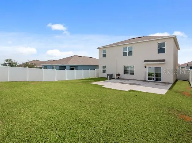 Fenced in back yard of 5/3 home for sale @ 9500 Black Walnut Dr. Clermont 34715