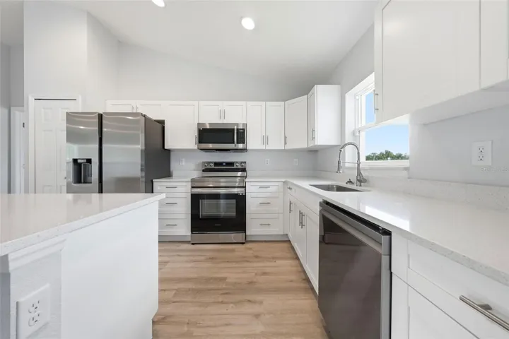 Modern kitchen with stainless steel appliances and ample cabinet space