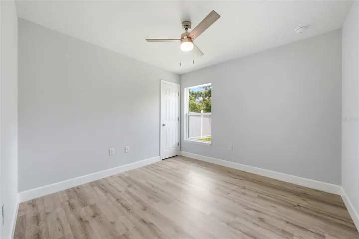 Additional guest bedroom offering flexibility for family, guests, or office space