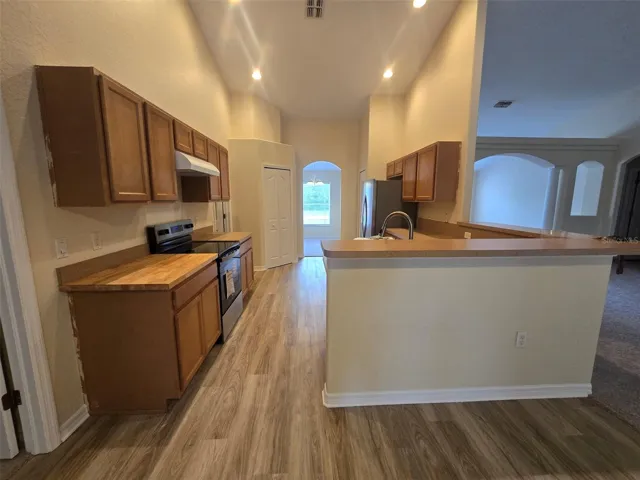KITCHEN WITH NEW STAINLESS-STEEL APPLIANCE