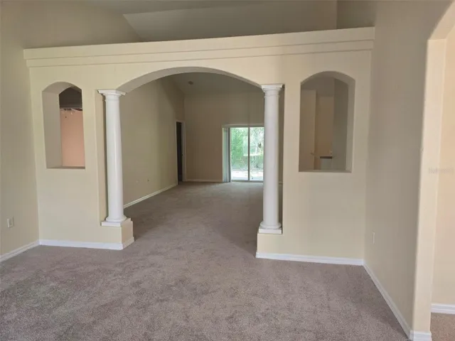 LOOKING INTO THE FAMILY ROOM/DEN FROM THE LIVING ROOM